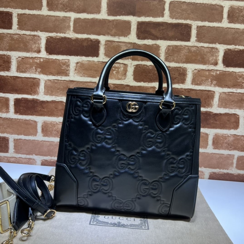 G*u*i top handle bags